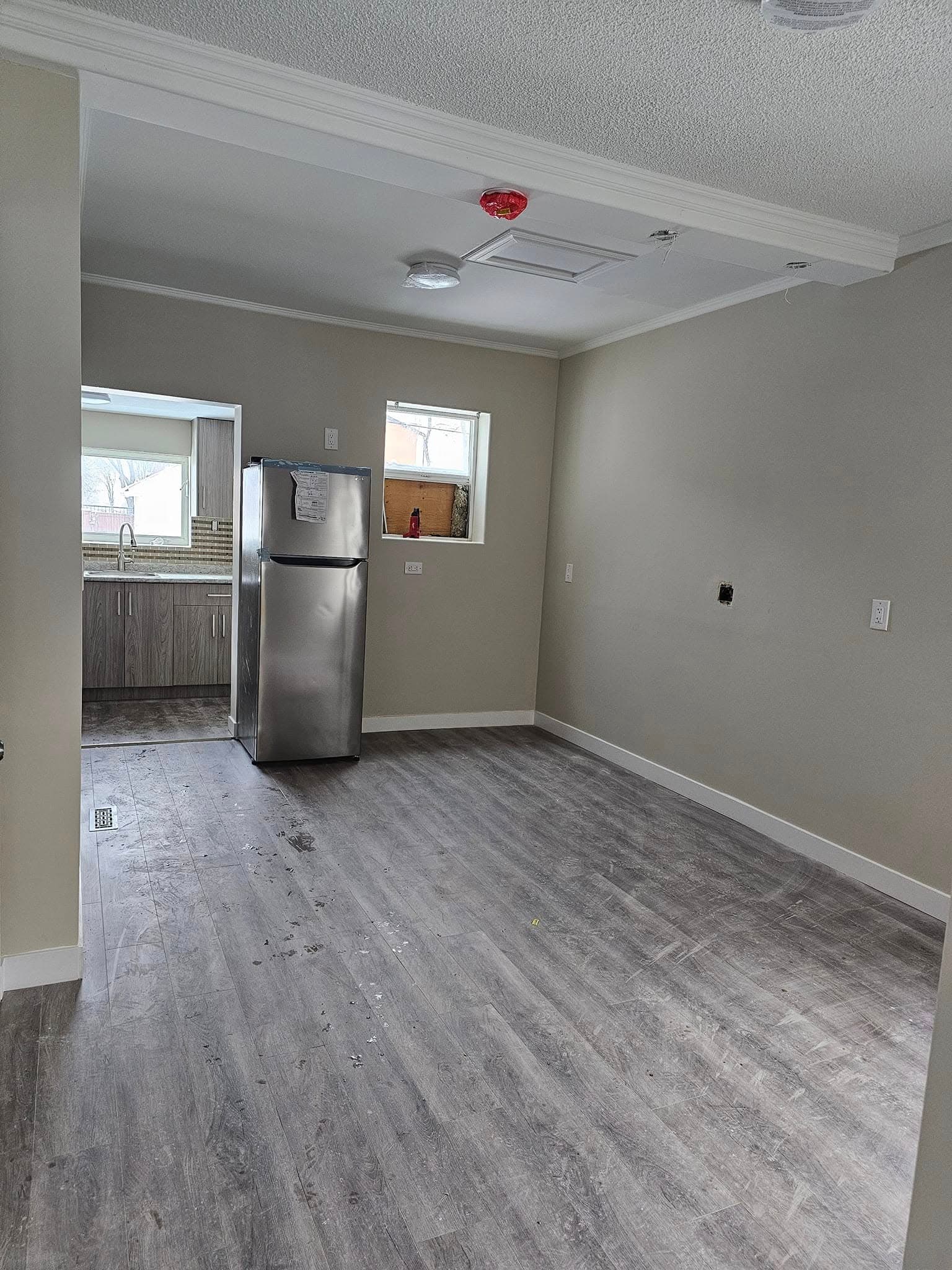 Renovated open-plan suite with new flooring