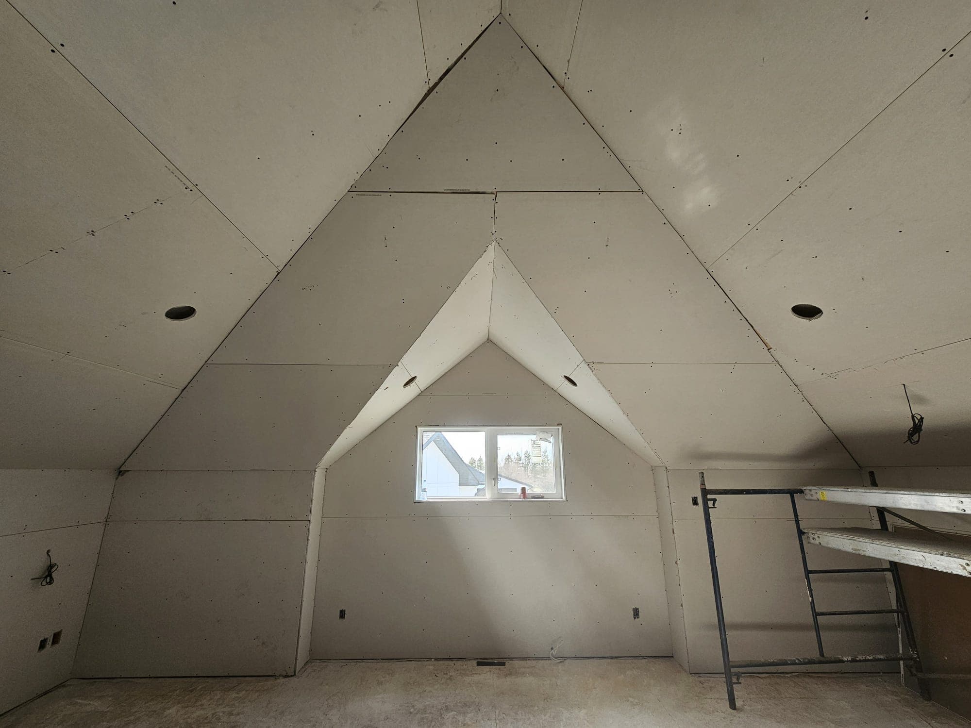 Drywall installed on a vaulted ceiling